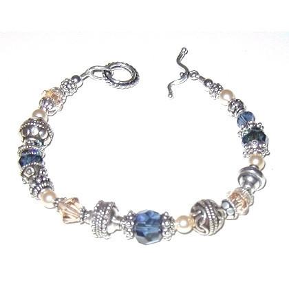 A Pearl And Navy Blue Stone Bracelet 
